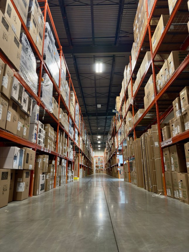 A large working floor during a shift, seen from ground level.